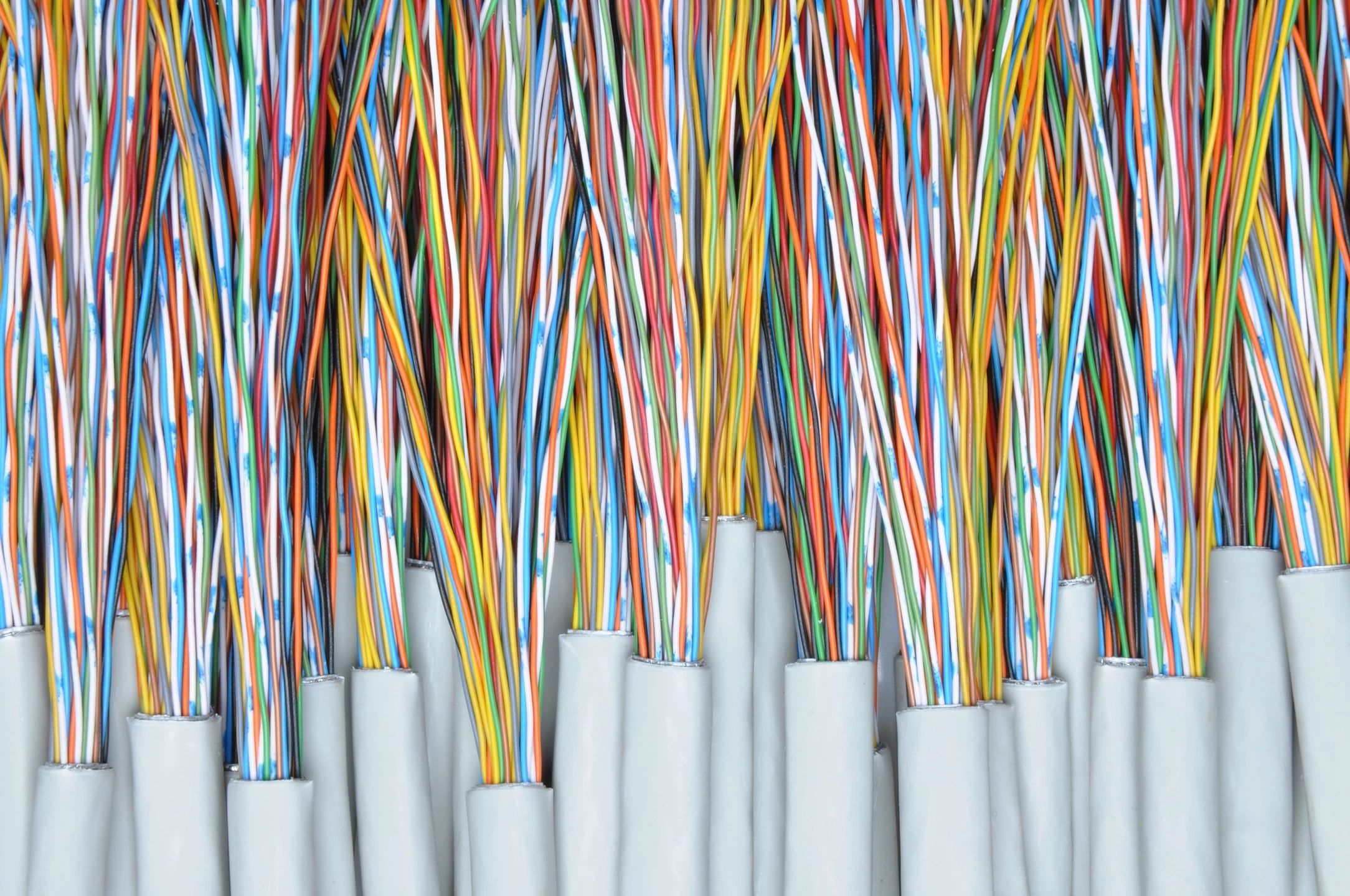 Bundles of color-coded low-voltage copper cabling